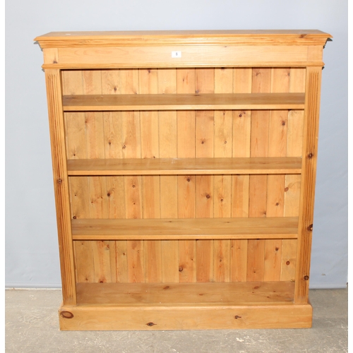 8 - Modern pine bookcase with 3 adjustable shelves, approx 122cm wide