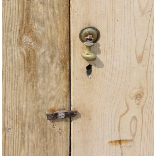 73 - A Victorian pine 2 door cupboard with brass handles, approx 168cm x 94cm x 49cm