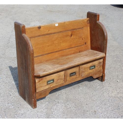 79 - An antique pine settle or bench with 3 drawers to base, approx 119cm wide