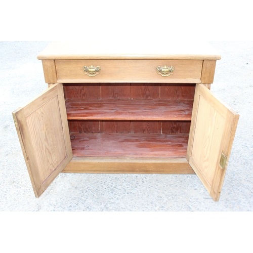 84 - An antique pine small hall cupboard or sideboard with single drawer over cupboard base, approx 106cm... 