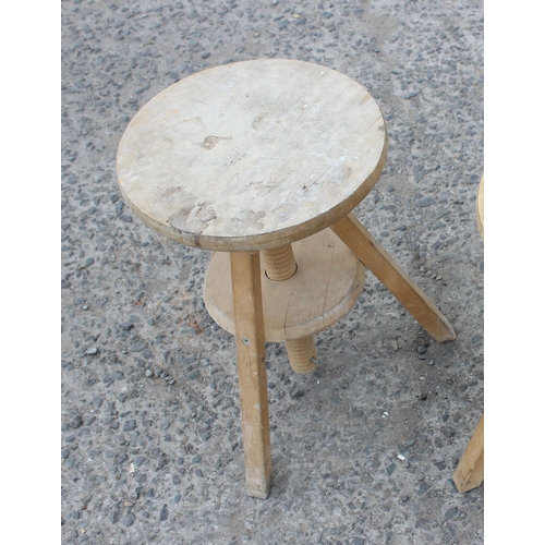 101 - 2 adjustable wooden potters stools