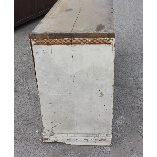 104 - A late 19th or early 20th century painted pine shop counter or sideboard with 6 storage recesses, ap... 