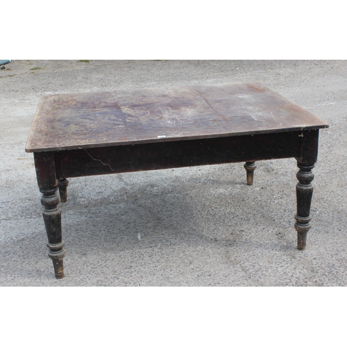 106 - A large antique dining table with painted pine base and mahogany top, approx 153cm x 122cm