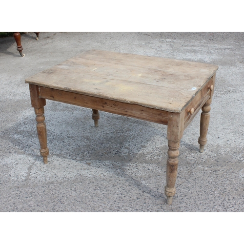 107 - A Victorian country pine farmhouse kitchen table with single drawer, approx 113cm x 83cm