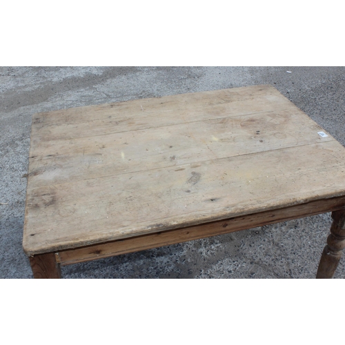 107 - A Victorian country pine farmhouse kitchen table with single drawer, approx 113cm x 83cm