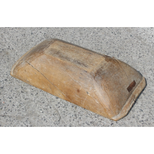 112 - A European wooden trencher style dough bowl or trough with vintage metal repair, approx 82cm x 40cm