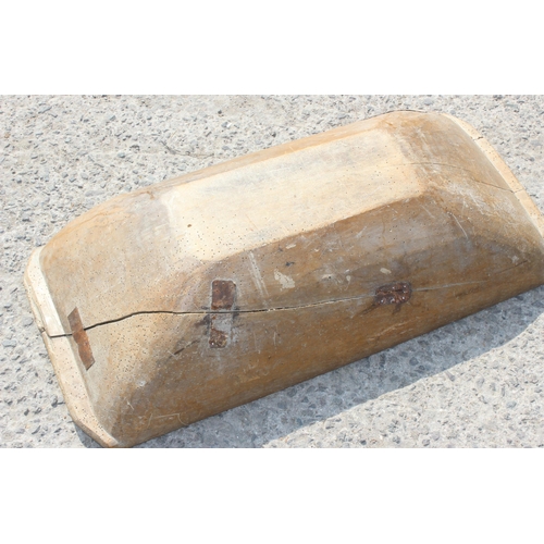 112 - A European wooden trencher style dough bowl or trough with vintage metal repair, approx 82cm x 40cm