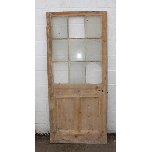 118 - 3 antique stripped pine doors, the largest approx 198cm x 88cm