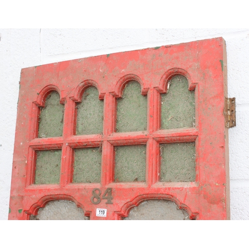 119 - An antique red painted front door in the gothic revival style, approx 203cm x 81cm