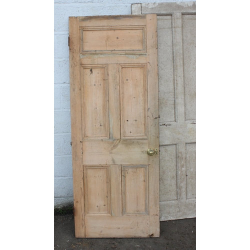 120 - 3 antique stripped pine doors, 2 with brass door furniture, the largest approx 203cm x 82cm