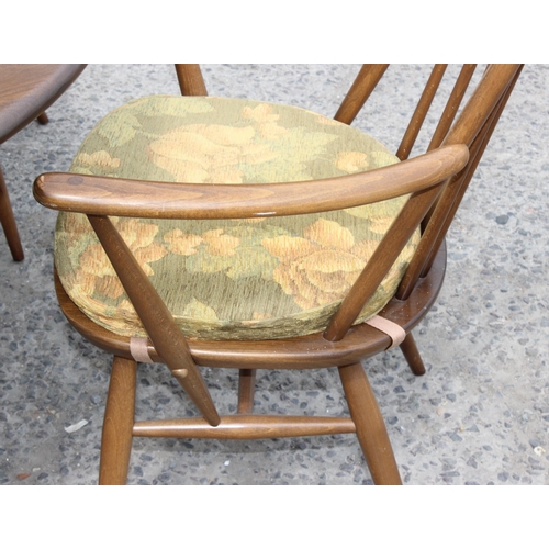 122 - Ercol circular table and 4 Ercol Windsor Swan 876 dining chairs, 2 carvers and 2 dining, the table a... 