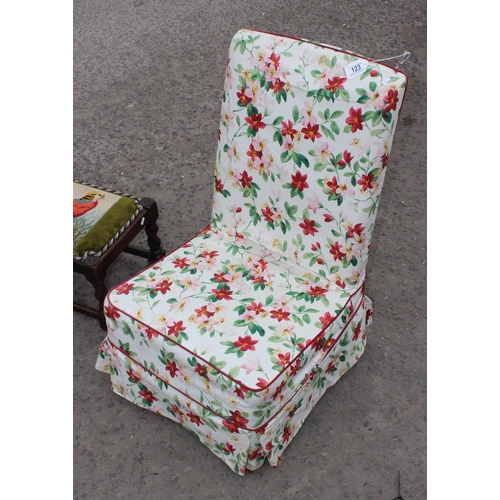 123 - A long low upholstered barleytwist footstool with Pheasant embroidery and a floral covered low chair... 