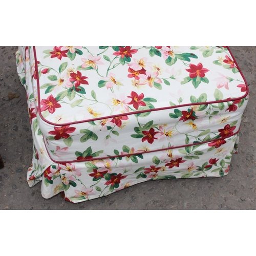 123 - A long low upholstered barleytwist footstool with Pheasant embroidery and a floral covered low chair... 