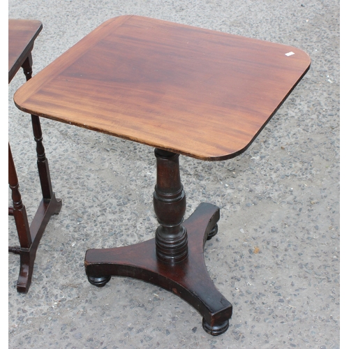 124 - An antique mahogany tilt topped table and a mahogany side table (2)