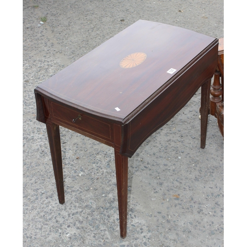 125 - An antique mahogany Pembroke table with Sheraton inlay and an antique walnut inlaid Sutherland table... 