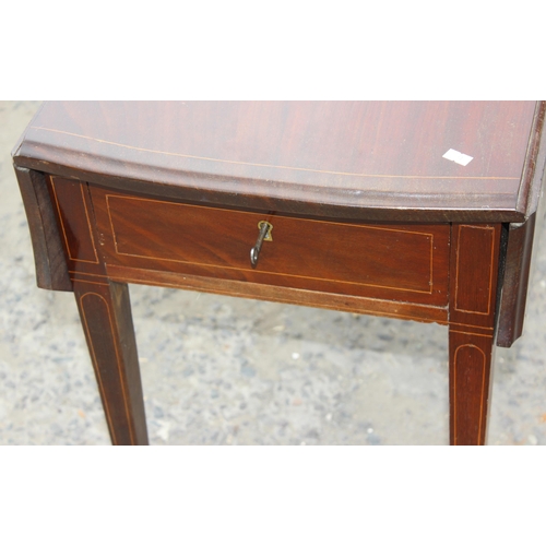 125 - An antique mahogany Pembroke table with Sheraton inlay and an antique walnut inlaid Sutherland table... 