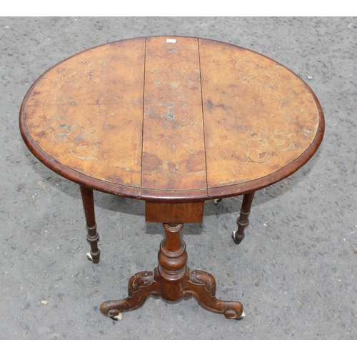 125 - An antique mahogany Pembroke table with Sheraton inlay and an antique walnut inlaid Sutherland table... 