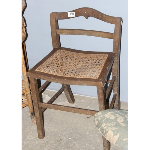 138 - A vintage upholstered gout stool, a vintage small Bergere seated stool and a retro bamboo effect 2 t... 