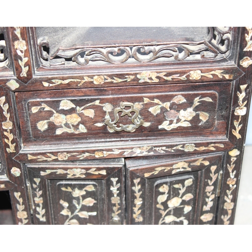 139 - Chinese carved hardwood and mother of pearl inlaid display stand, likely late 19th or early 20th Cen... 