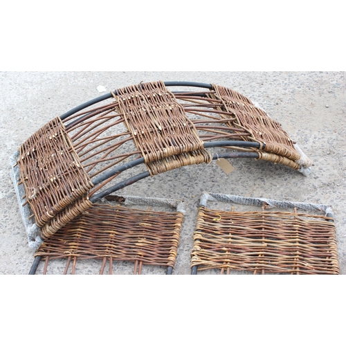 303 - A wicker and metal garden arch