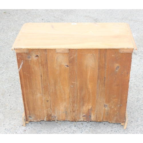 98 - A Victorian stripped pine 2 over 2 chest of drawers with brass drop handles, approx 83cm wide