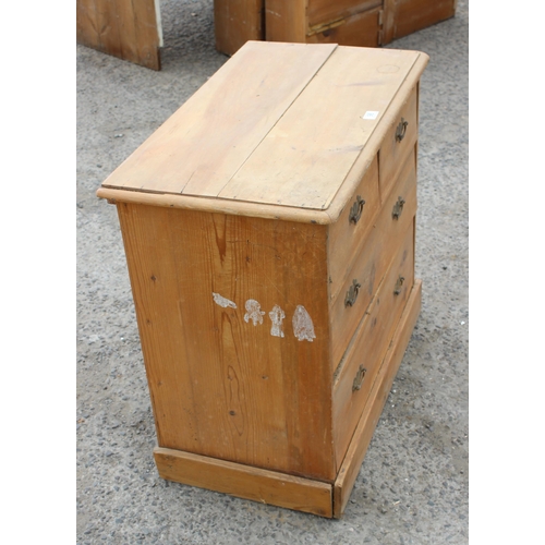 98 - A Victorian stripped pine 2 over 2 chest of drawers with brass drop handles, approx 83cm wide