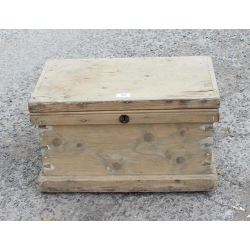 92 - A small antique pine trunk or strong box, approx 53cm wide