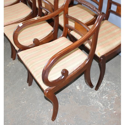 39 - A set of 8 Regency style sabre legged dining chairs with turned rail backs