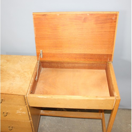 37 - A retro Stag 3 drawer desk with lift up lidded compartment, approx 97cm wide