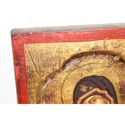 404 - The Virgin of Vladimir, a hand painted icon on wooden panel, unknown age, approx 23cm x 18cm