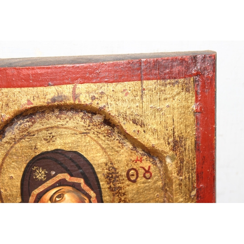 404 - The Virgin of Vladimir, a hand painted icon on wooden panel, unknown age, approx 23cm x 18cm