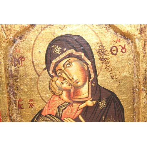 404 - The Virgin of Vladimir, a hand painted icon on wooden panel, unknown age, approx 23cm x 18cm