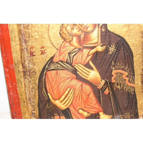 404 - The Virgin of Vladimir, a hand painted icon on wooden panel, unknown age, approx 23cm x 18cm