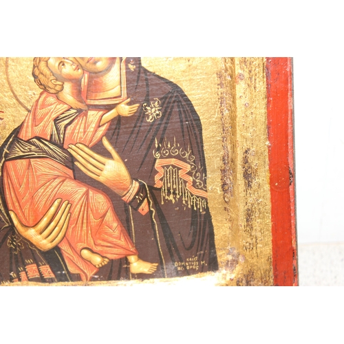 404 - The Virgin of Vladimir, a hand painted icon on wooden panel, unknown age, approx 23cm x 18cm