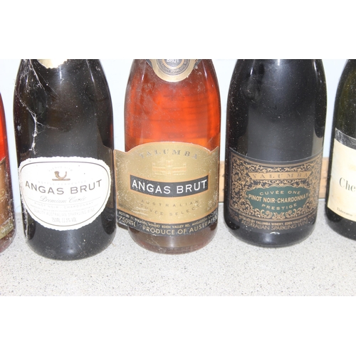 1613A - 7 bottles of vintage sparkling wine