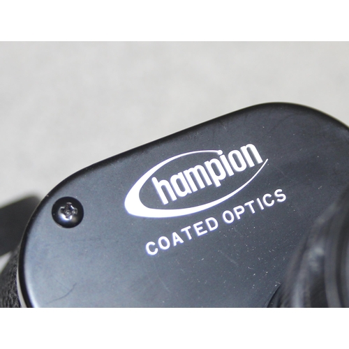 651A - Pair of Champion binoculars 10x50 in case