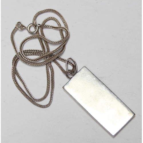 1108 - A 1977 silver jubilee ingot pendant on silver chain, marked for Birmingham 1977 by P & R Bushell, on... 