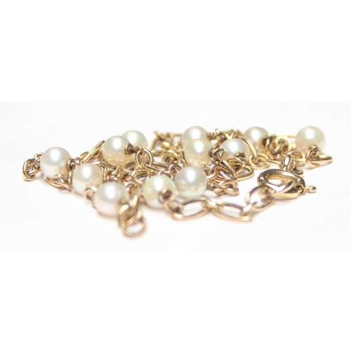 1133 - A 9ct gold and seed pearl necklace, approx 40cm long, clasp marked and XRF confirmed, approx 6.33g g... 