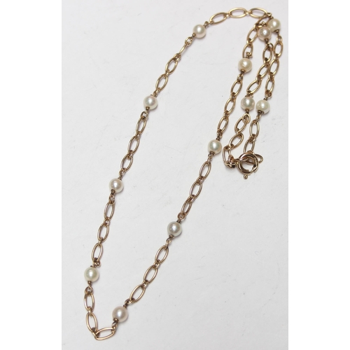 1133 - A 9ct gold and seed pearl necklace, approx 40cm long, clasp marked and XRF confirmed, approx 6.33g g... 