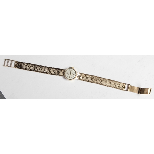 1306 - A 9ct gold ladies watch by Accurist, with 9ct gold case and strap, approx 26.13g gross