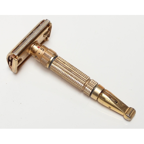 1608 - An unusual vintage Gillette gold plated razor, believed to be a D-1 Toggle