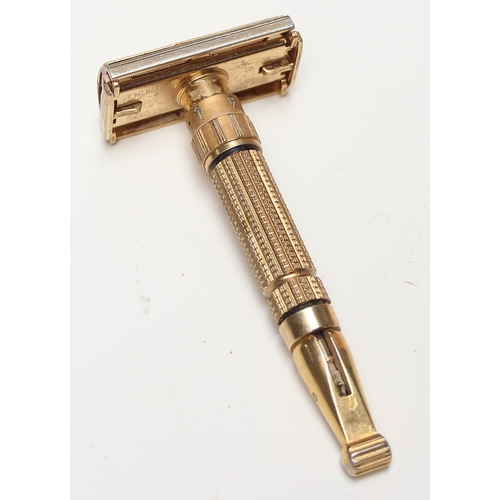 1608 - An unusual vintage Gillette gold plated razor, believed to be a D-1 Toggle