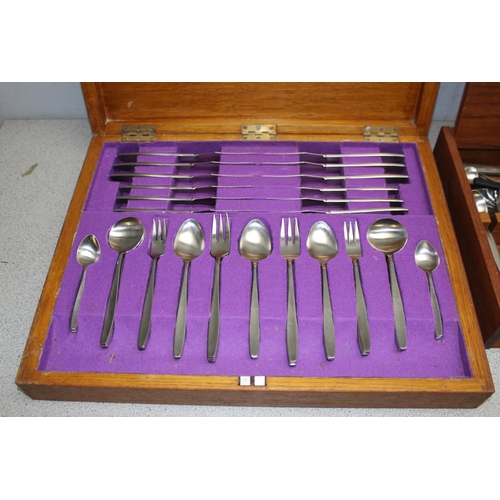 1023 - 2 vintage canteens of cutlery in wooden cases, one by Elkington & Co