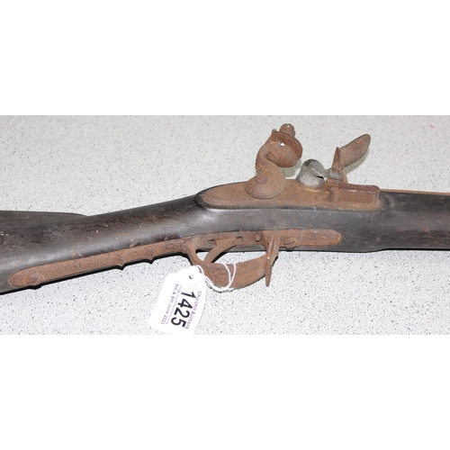 1425 - A large antique flintlock rifle or musket, no visible marking, approx 147cm long