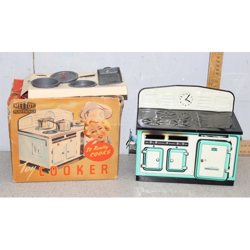 1527 - Mettoy 1950’s toy tin plate cooker with metal pots and pans, baking tray and spirit burner in origin... 