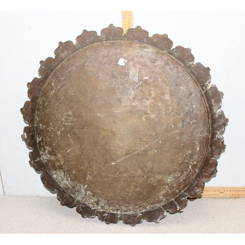 1749 - Large Asian design brass charger depicting a Prince on horseback, approx 60cm diameter