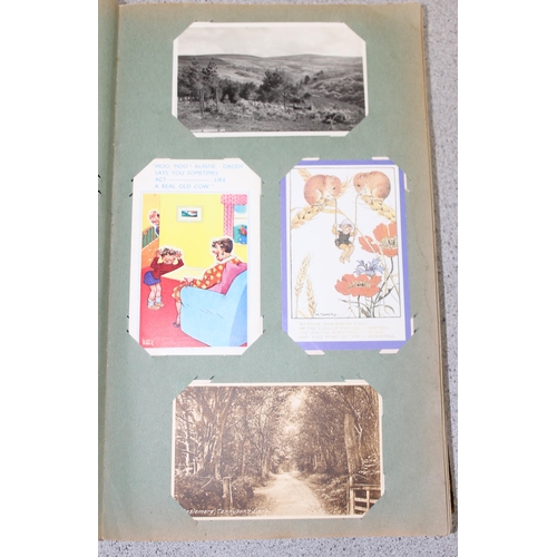 505 - Vintage postcard album and contents