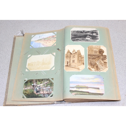 505 - Vintage postcard album and contents