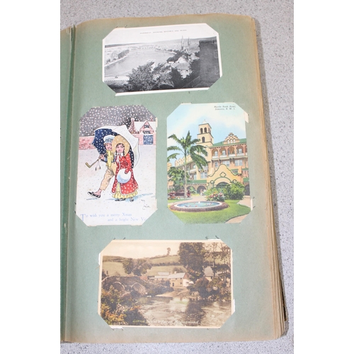 505 - Vintage postcard album and contents