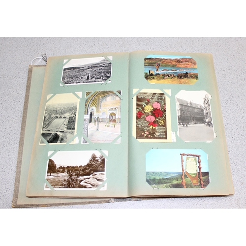 505 - Vintage postcard album and contents